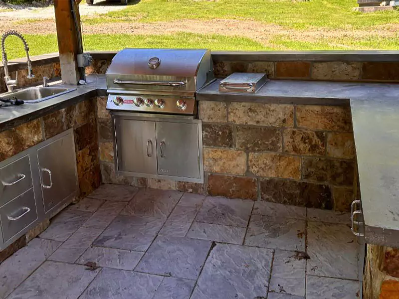 COMMUNITY OUTDOOR KITCHEN Four Burner Stainless Steel Grill with Infared Rotisserie and side burner.